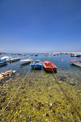 Fototapeta na wymiar Simple Boats in an Italian Fishing Village