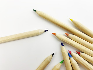 color pencils on a white background