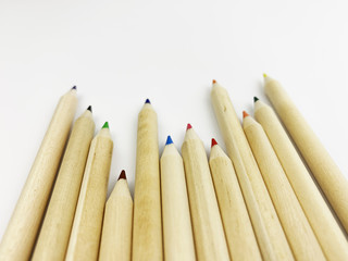 color pencils on a white background
