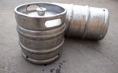 Beer kegs 50 liters. Warehouse. Indoors and outdoors. Silver colour.