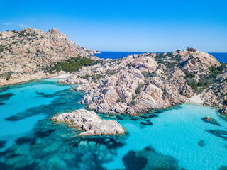 Aerial view of the coast of Cala Coticcio, one of the most Beautiful beaches in the world, Island of La Maddalena, Sardinia. © Alien
