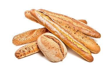 Assortment of baked bread, baguette with seed, sesame, sunflower, pumpkin. Multigrain bakery products isolated on white. Different fresh bread, bun, french baguettes wheat, buckwheat, food background