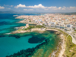 Fototapeta na wymiar AERIAL VIEW OF THE CITY OF ALGHERO FROM THE BEACH