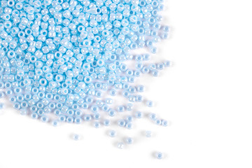 Scattering of colored beads on a white background