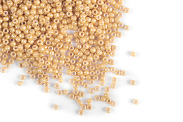 Scattering of colored beads on a white background