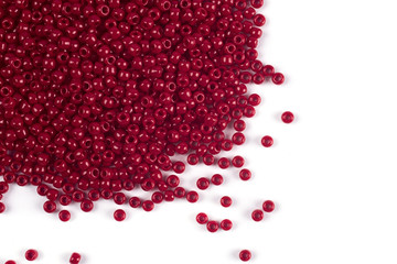 Scattering of colored beads on a white background