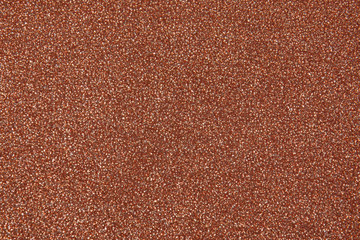 Glitter beige shiny background, abstract texture for design.