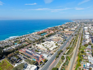 Aerial view of typical south california community condo next to the sea on the edge of the cliff during sunny day. Solana Beach. USA