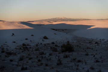 Sierra Blanca during sunset at White Sands National Park in Alamogordo, New Mexico. 