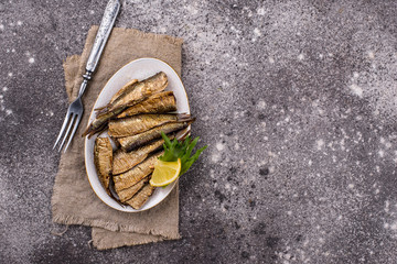 Canned smoked sprats in oil