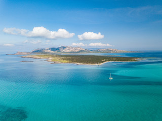 Aerial View of the Beautiful Stintino Beach With tower and The island of Asinara in Background