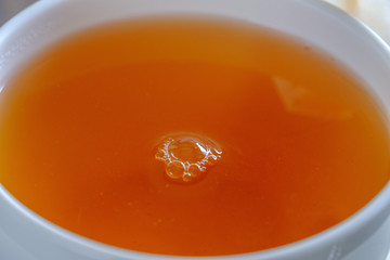 Fragrant and tasty tea in a cup close-up