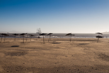 City beach with umbrellas, Essaouira