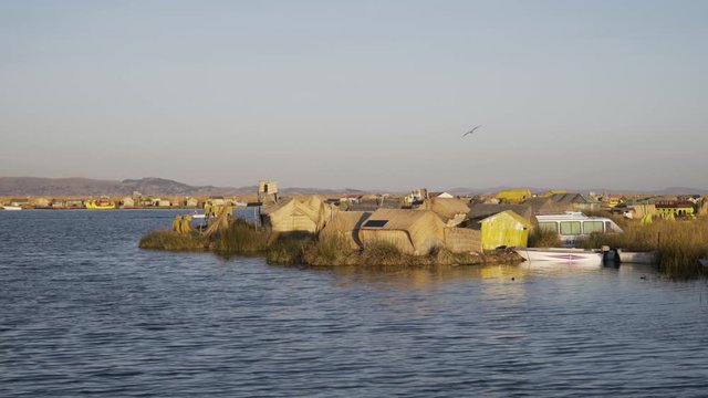 Traditional Uros floating reed islands on Lake Titicaca in the Andes Mountains at the border between Peru and Bolivia