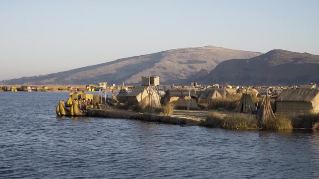 Traditional Uros floating reed islands on Lake Titicaca in the Andes Mountains at the border between Peru and Bolivia