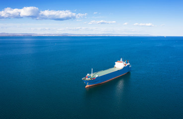 Aerial view of cargo ship in sea