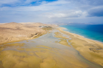 This is an aerial drone shot from Canary islands. Sotavento beach is on the coast of Fuerteventura island. October 2019