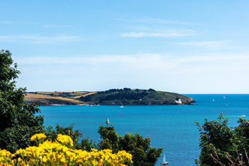 Obraz premium View of St. Anthony Head and lighthouse from Pendennis Castle