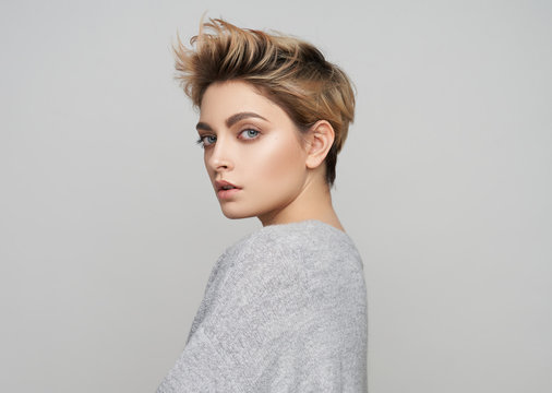 Portrait of sexy woman with short blonde hair