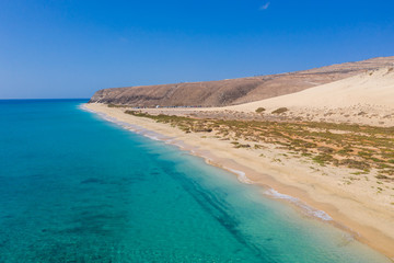 This is an aerial drone shot from Canary islands. Sotavento beach is on the coast of Fuerteventura island. October 2019