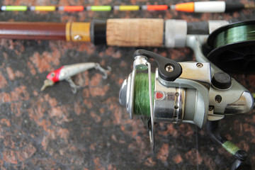  fishing equipment for fishing, spinning with a reel, fishing line, float and wobbler.