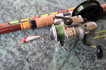 fishing equipment for fishing, spinning with a reel, fishing line, float and wobbler.