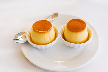 Caramel Custard Pudding in a White Plate