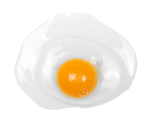 Raw hen egg with yolks isolated on white background, top view