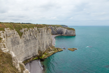 Fototapeta na wymiar Etretat, France. Alabaster coast: picturesque cliffs