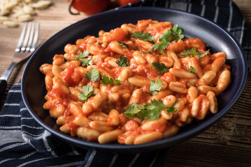 Cavatelli pasta with fresh tomato sauce.