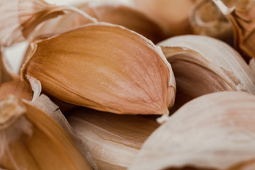 Fresh garlic cloves, top view. Food background, texture