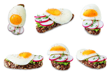Radish avocado egg rye sandwiches on a white isolated background