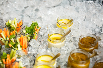 vegetarian appetizer lie on ice, buffet table