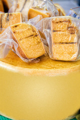 Hard cheese display street market Bled Lake Slovenia