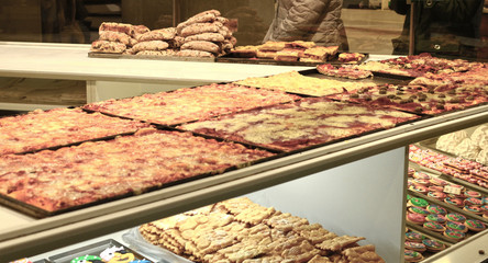 Italian pizza in a shop window of Bergamo, Italy