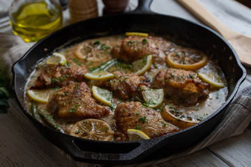 lemon butter chicken in iron skillet