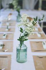 Beautiful wedding decorated table with a white tablecloth