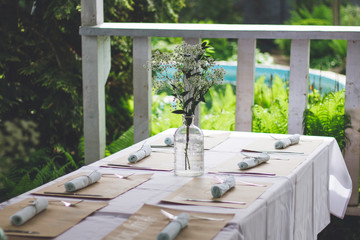 Beautiful wedding decorated table with a white tablecloth