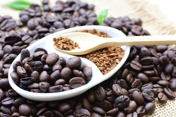Coffee beans, accompanied by processed coffee powder