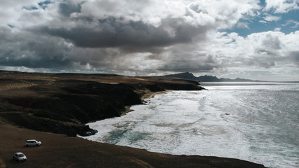 cliff aerial waves storm