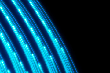 Blue light rays against a dark background