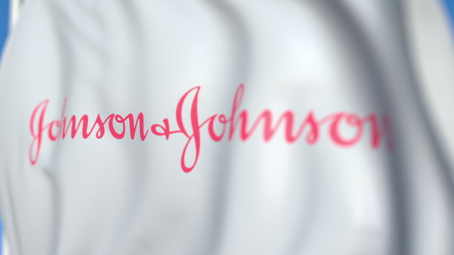 Waving flag with Johnson & Johnson logo, close-up. Editorial 3D rendering