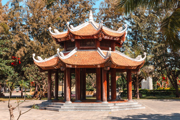 Oriental-style gazebo surrounded by trees