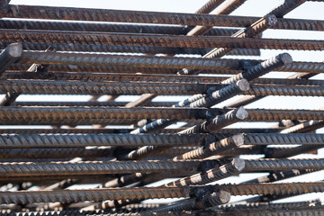 Steel reinforcement bars. Reinforced iron for concrete construction. Closeup of rebars.