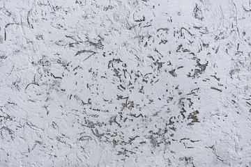 Abstract background with rough texture. White-gray plaster copy space