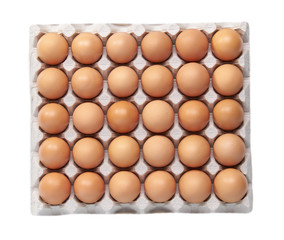 chicken eggs in paper packaging isolated on white background, top view.
