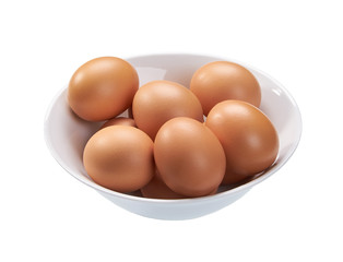 Eggs in ceramic bowl isolated on white background.