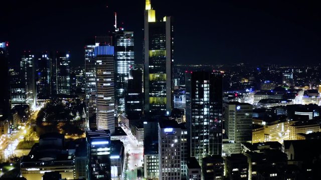 Aerial View Frankfurt skyscrapers financial district at night in 4k