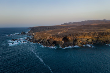 Ajuy, Fuerteventura, Canary Islands Spain - october 2019: the Cuevas de Ajuy, a network of limestone cliffs and caves on the Atlantic ocean coast, once used by pirates. Aerial view