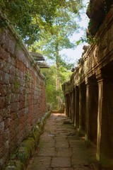 Fototapeta na wymiar Inner gallery at the Banteay Kdei temple ruins, in Angkor Wat complex near Siem Reap, Cambodia.